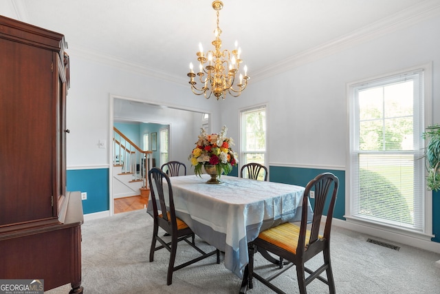 150 Tramore Trce, Tyrone, GA 30290 - dining area with stairway, a chandelier, light colored carpet, and ornamental molding