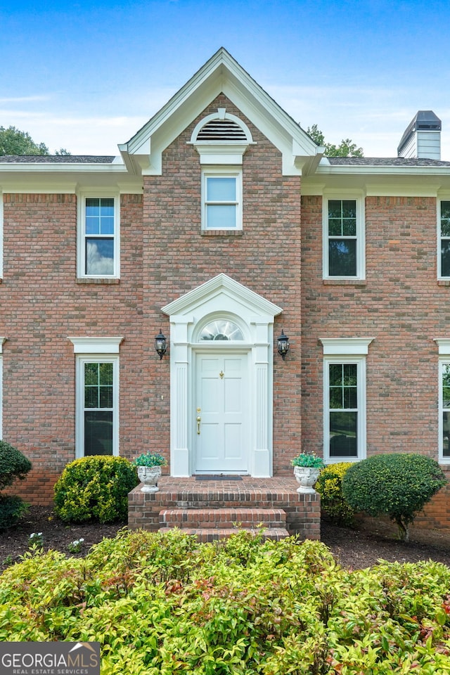 150 Tramore Trce, Tyrone, GA 30290 - view of front of home featuring brick siding and a chimney