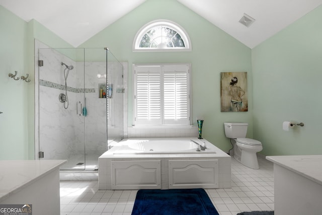 150 Tramore Trce, Tyrone, GA 30290 - bathroom featuring a whirlpool tub, tile patterned flooring, a marble finish shower, vanity, and vaulted ceiling