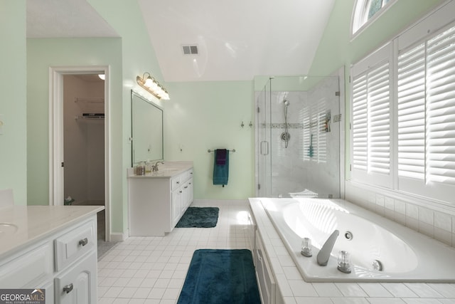 150 Tramore Trce, Tyrone, GA 30290 - bathroom with a stall shower, vanity, a whirlpool tub, tile patterned flooring, and lofted ceiling