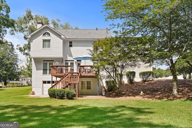 150 Tramore Trce, Tyrone, GA 30290 - back of house featuring a deck, a chimney, stairs, a lawn, and a shingled roof