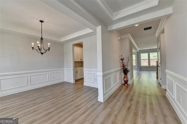 6867 Kate, Flowery Branch, GA 30542 - hallway with a tray ceiling, a decorative wall, light wood finished floors, a chandelier, and ornamental molding