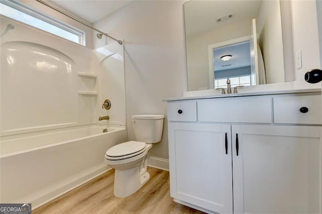 6867 Kate, Flowery Branch, GA 30542 - full bath with shower / washtub combination, vanity, and wood finished floors