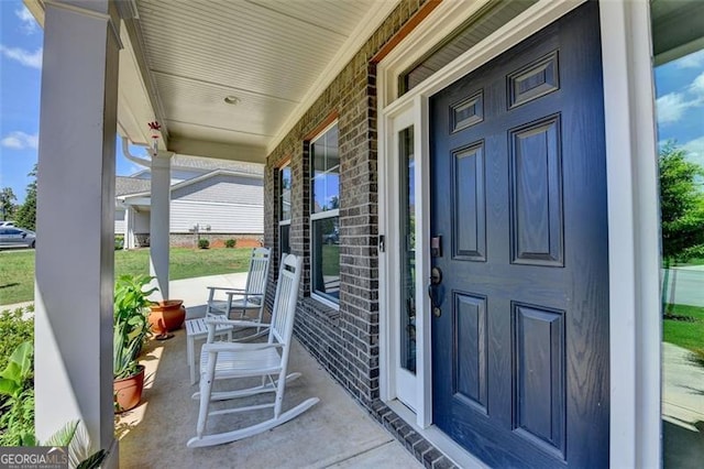 6867 Kate, Flowery Branch, GA 30542 - entrance to property with covered porch and brick siding