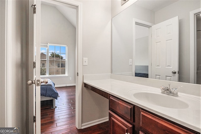 915 Pebble Creek Trl, Suwanee, GA 30024 - bathroom with vanity, wood finished floors, and ensuite bathroom