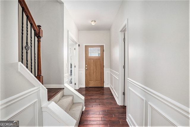 915 Pebble Creek Trl, Suwanee, GA 30024 - foyer featuring stairway, dark wood finished floors, a wainscoted wall, and a decorative wall