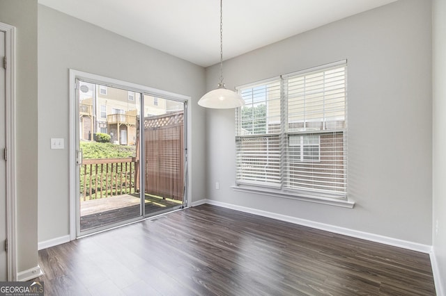801 Tulip Poplar Way Unit 2501, Lawrenceville, GA 30044 - unfurnished dining area featuring wood finished floors and baseboards