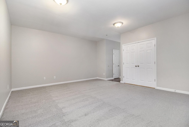 801 Tulip Poplar Way Unit 2501, Lawrenceville, GA 30044 - carpeted spare room with baseboards