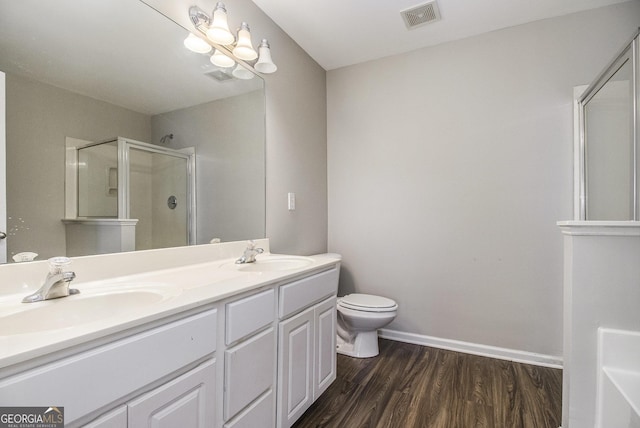 801 Tulip Poplar Way Unit 2501, Lawrenceville, GA 30044 - full bath with an enclosed shower, double vanity, and wood finished floors