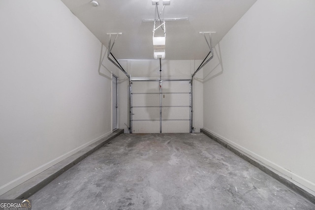 801 Tulip Poplar Way Unit 2501, Lawrenceville, GA 30044 - garage with baseboards and a garage door opener