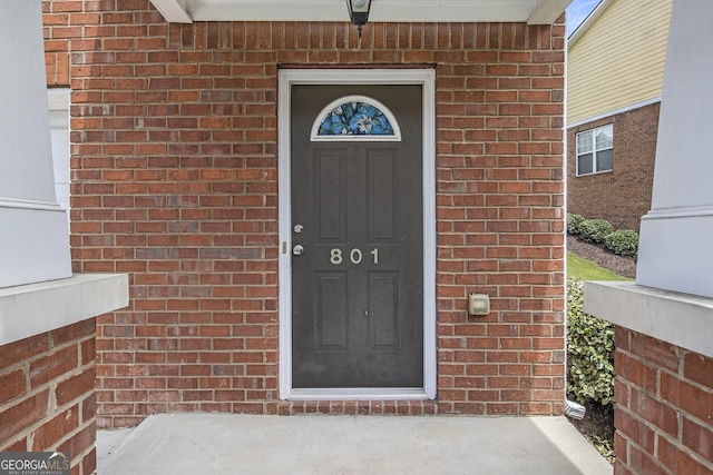 801 Tulip Poplar Way Unit 2501, Lawrenceville, GA 30044 - doorway to property with brick siding