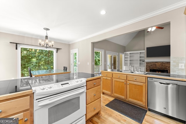 379 Sweetwater Rdg, Hoschton, GA 30548 - kitchen with white electric stove, dishwasher, plenty of natural light, light wood-style flooring, and crown molding