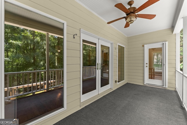 379 Sweetwater Rdg, Hoschton, GA 30548 - unfurnished sunroom featuring french doors, healthy amount of natural light, and ceiling fan