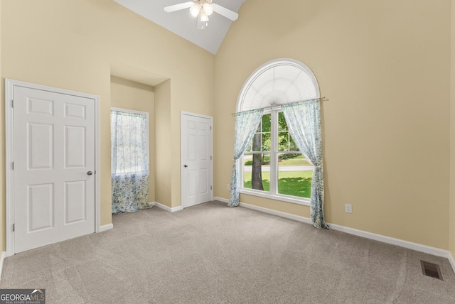 379 Sweetwater Rdg, Hoschton, GA 30548 - carpeted spare room with ceiling fan and high vaulted ceiling