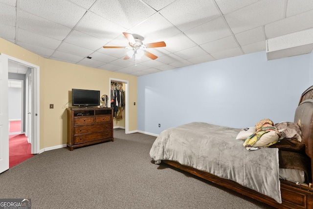 379 Sweetwater Rdg, Hoschton, GA 30548 - carpeted bedroom with a drop ceiling, a closet, ceiling fan, and a spacious closet