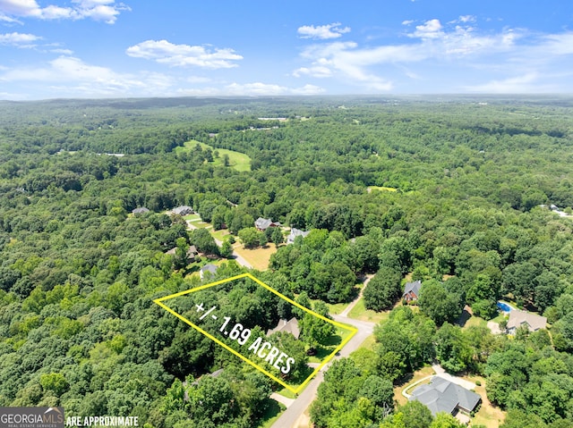 379 Sweetwater Rdg, Hoschton, GA 30548 - aerial view of property and surrounding area featuring a forest and property boundaries highlighted