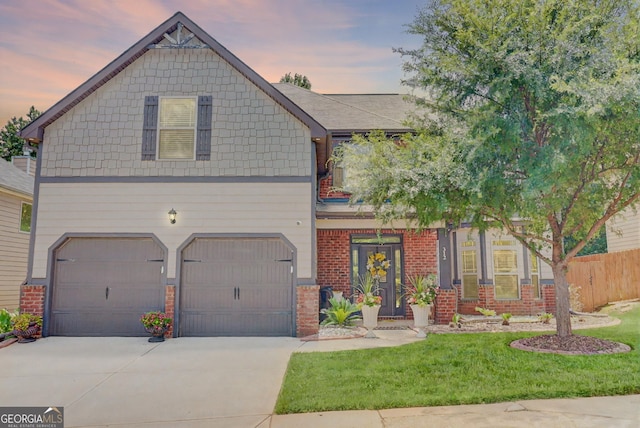 312 Sierra Ct, Mcdonough, GA 30253 - view of front of property with driveway, brick siding, and a garage