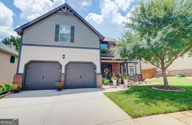 312 Sierra Ct, Mcdonough, GA 30253 - craftsman inspired home with brick siding, an attached garage, and driveway