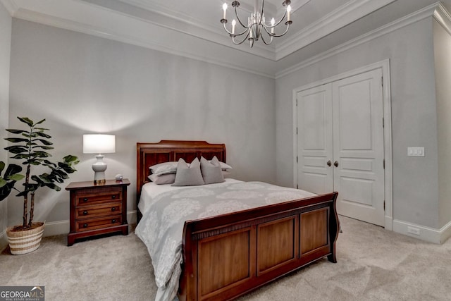 272 Lake Forrest Ln NE, Atlanta, GA 30342 - bedroom featuring light carpet, ornamental molding, a chandelier, a closet, and a raised ceiling