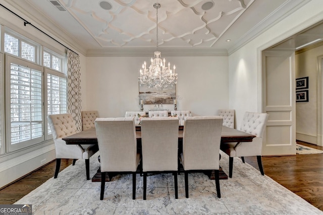 272 Lake Forrest Ln NE, Atlanta, GA 30342 - dining area with a chandelier, crown molding, and wood finished floors