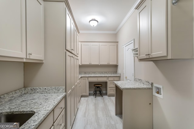 110 Wellington Way, Canton, GA 30115 - washroom featuring cabinet space, hookup for a washing machine, crown molding, and an office area