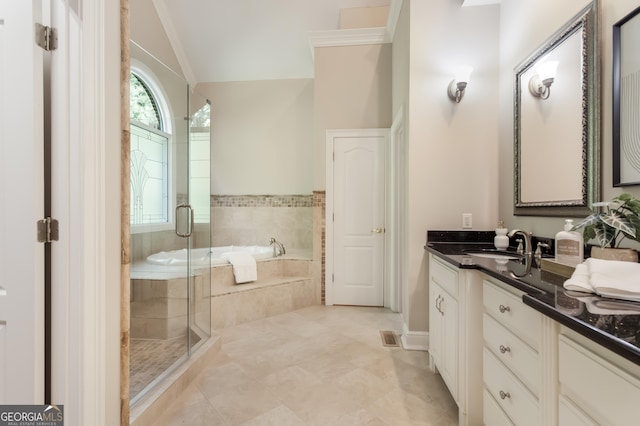 110 Wellington Way, Canton, GA 30115 - full bath with vanity, a bath, a stall shower, lofted ceiling, and crown molding