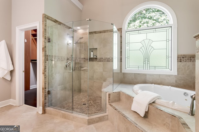 110 Wellington Way, Canton, GA 30115 - bathroom with a bath, a stall shower, and tile patterned floors