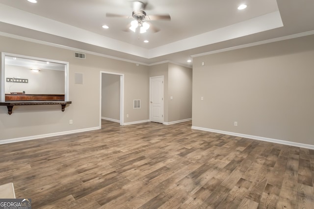 110 Wellington Way, Canton, GA 30115 - unfurnished room featuring ceiling fan, ornamental molding, wood finished floors, a tray ceiling, and recessed lighting