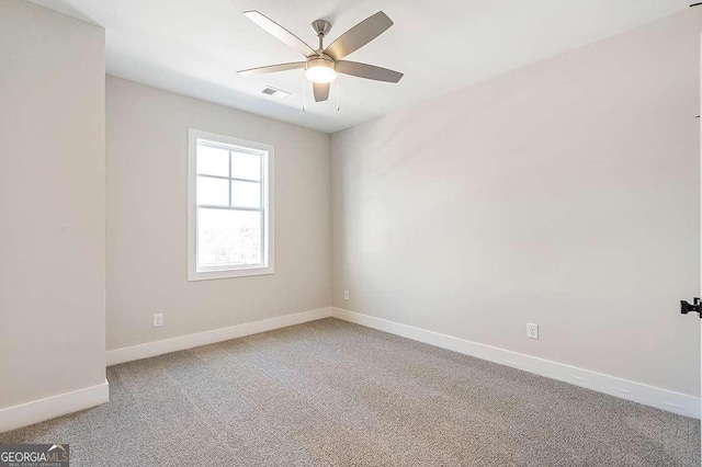 148 Palm St, Holly Springs, GA 30115 - unfurnished room with light colored carpet and a ceiling fan