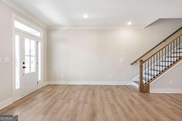 148 Palm St, Holly Springs, GA 30115 - entrance foyer with light wood-type flooring, stairs, ornamental molding, and recessed lighting