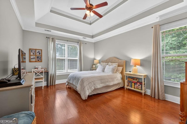 43 Emily Ln, Bogart, GA 30622 - bedroom featuring a tray ceiling, ornamental molding, wood finished floors, and ceiling fan