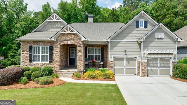 1071 Creekwood Cir, Madison, GA 30650 - craftsman-style home featuring stone siding, concrete driveway, a front lawn, and a chimney