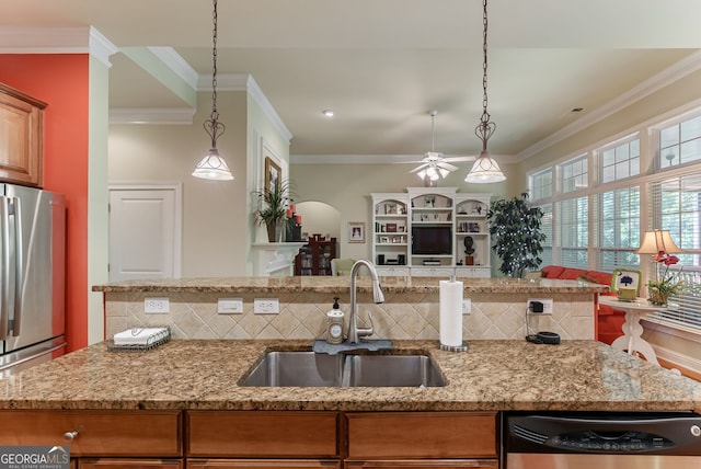 1071 Creekwood Cir, Madison, GA 30650 - kitchen with dishwashing machine, decorative backsplash, crown molding, light stone counters, and a ceiling fan