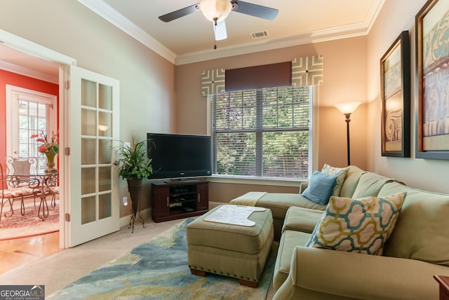 1071 Creekwood Cir, Madison, GA 30650 - carpeted living room featuring crown molding and ceiling fan