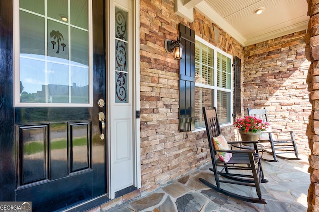 1071 Creekwood Cir, Madison, GA 30650 - entrance to property featuring a porch and brick siding