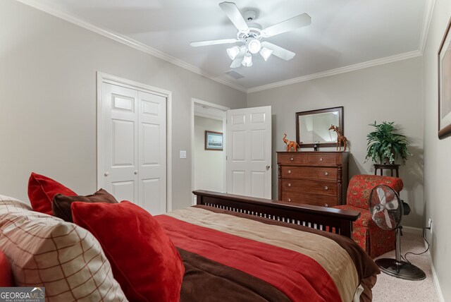 1071 Creekwood Cir, Madison, GA 30650 - carpeted bedroom featuring ornamental molding, a closet, and ceiling fan
