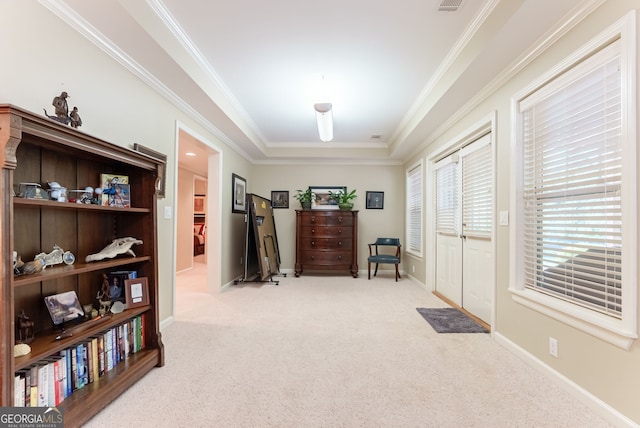 1071 Creekwood Cir, Madison, GA 30650 - corridor with light carpet, crown molding, and a tray ceiling