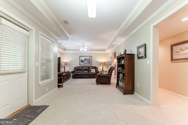 1071 Creekwood Cir, Madison, GA 30650 - living area with carpet floors, a ceiling fan, and ornamental molding