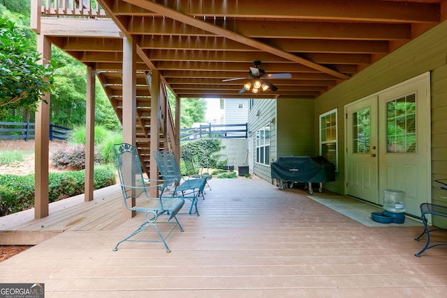 1071 Creekwood Cir, Madison, GA 30650 - wooden terrace with french doors, stairs, and a grill