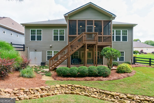 1071 Creekwood Cir, Madison, GA 30650 - back of house with stairs and a sunroom