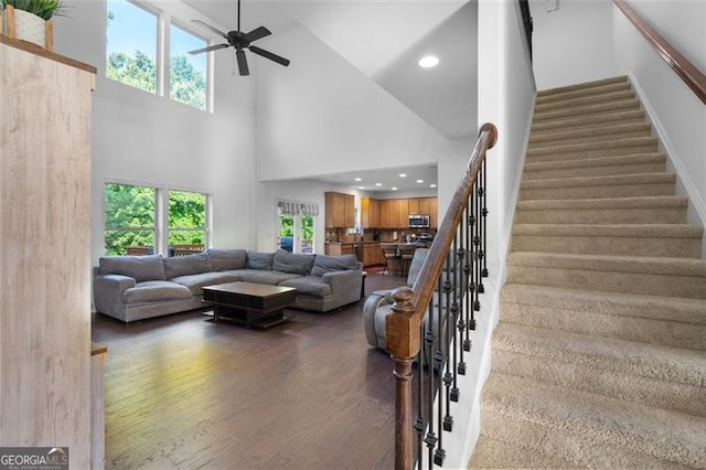 109 Hale View Cir, Canton, GA 30114 - living area with a high ceiling, wood finished floors, a ceiling fan, stairway, and recessed lighting