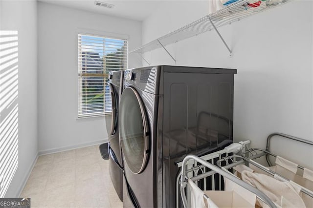 109 Hale View Cir, Canton, GA 30114 - laundry room with washer and dryer and baseboards