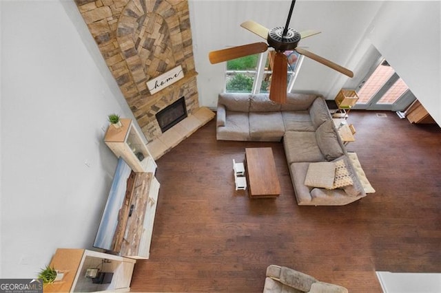 109 Hale View Cir, Canton, GA 30114 - living area featuring ceiling fan, wood finished floors, a stone fireplace, and lofted ceiling