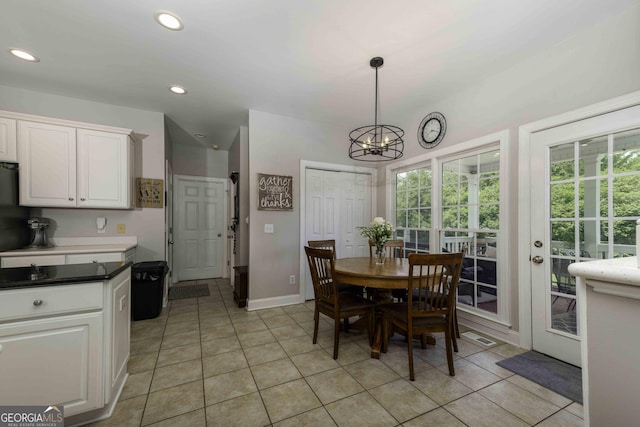 481 Fields Ferry Dr NE, Calhoun, GA 30701 - dining space featuring healthy amount of natural light, light tile patterned floors, a chandelier, and recessed lighting