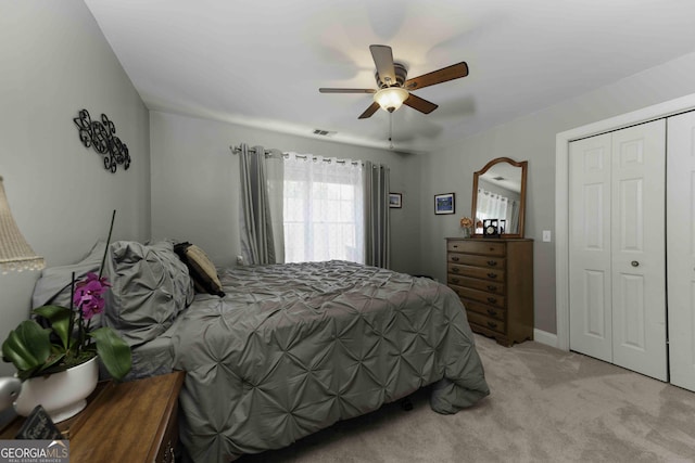481 Fields Ferry Dr NE, Calhoun, GA 30701 - bedroom featuring light carpet, a closet, and a ceiling fan