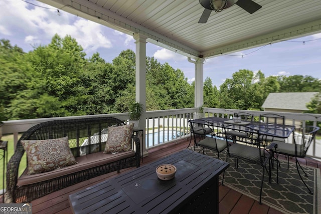 481 Fields Ferry Dr NE, Calhoun, GA 30701 - deck with outdoor dining space and a ceiling fan