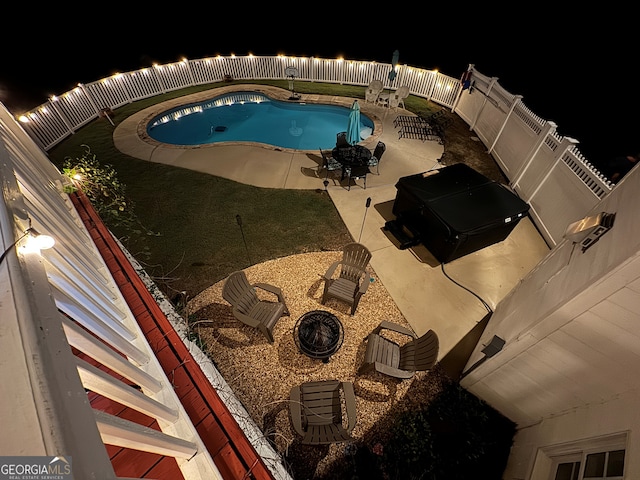 481 Fields Ferry Dr NE, Calhoun, GA 30701 - pool at twilight featuring a patio, a fenced backyard, and a grill