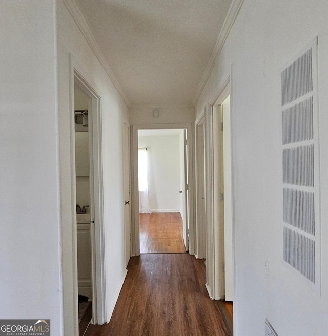 1055 Scruggs Cir, Bartow, GA 30413 - hall featuring ornamental molding and dark wood-style flooring