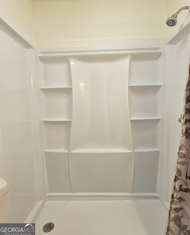 1055 Scruggs Cir, Bartow, GA 30413 - bathroom with a stall shower