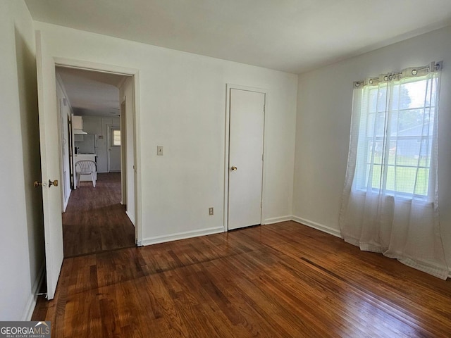 1055 Scruggs Cir, Bartow, GA 30413 - unfurnished bedroom with wood finished floors and baseboards